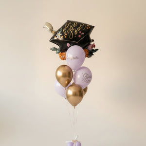 Purple and Gold Latex Balloons and a Jumbo Graduation Cap Mylar Balloon