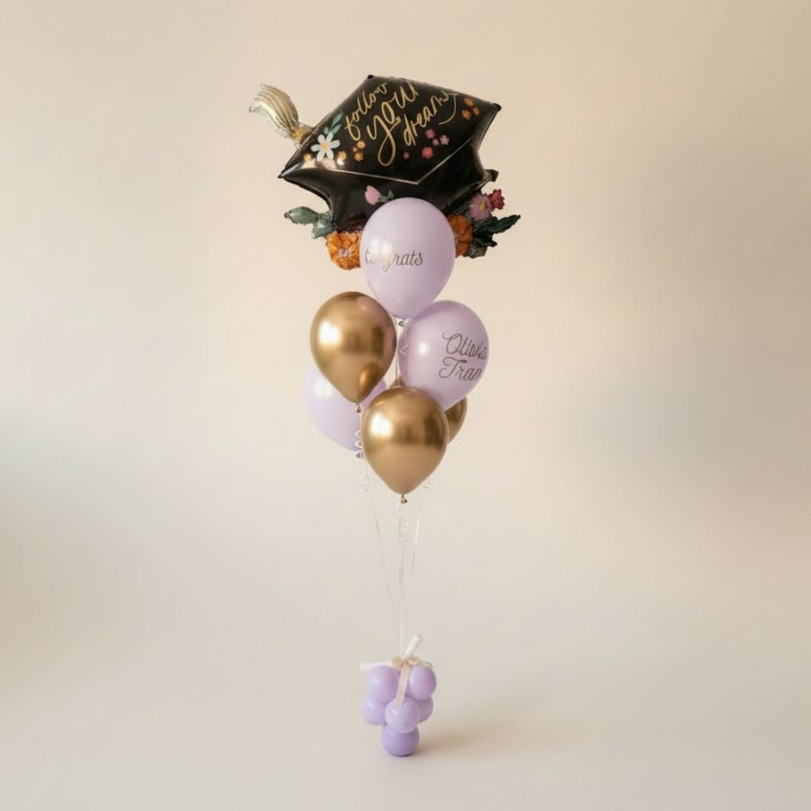 Purple and Gold Latex Balloons and a Jumbo Graduation Cap Mylar Balloon