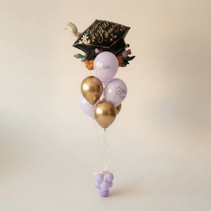 Purple and Gold Latex Balloons and a Jumbo Graduation Cap Mylar Balloon